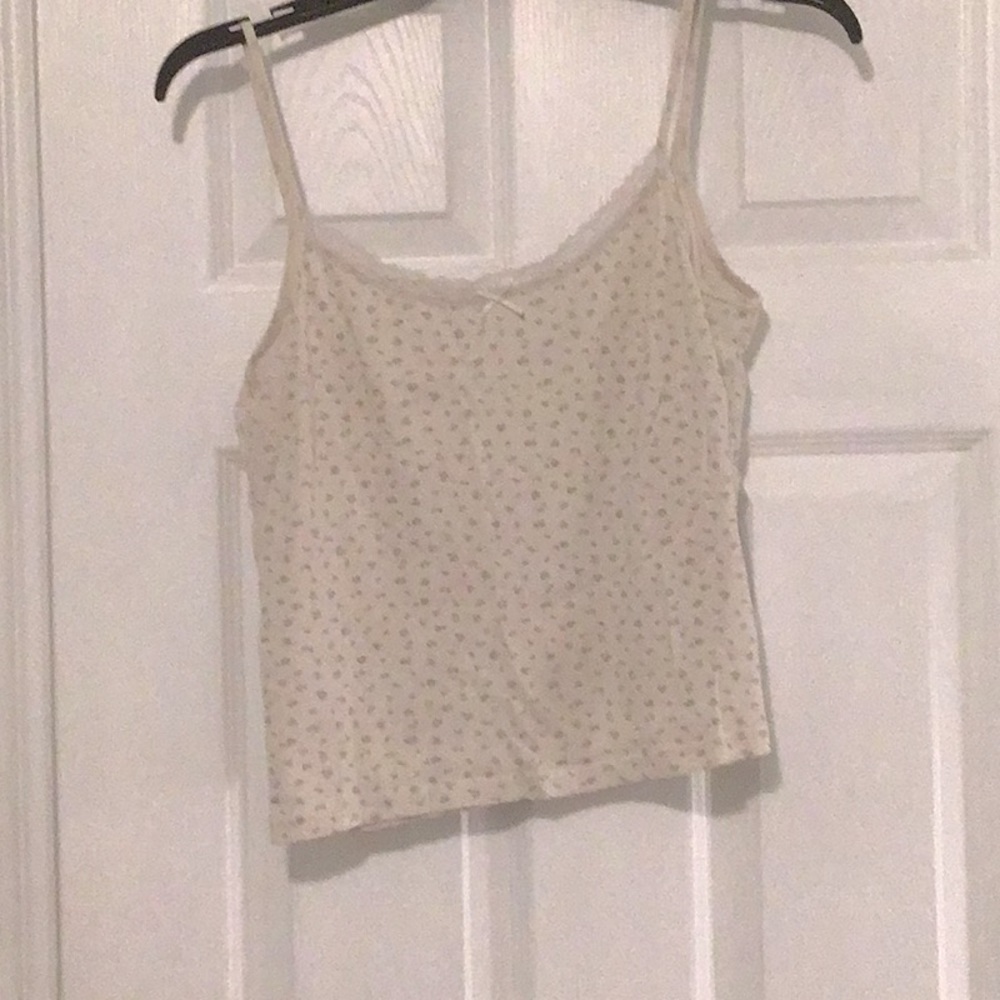 off white brandy melville tank top with lace, bow, and green flowers